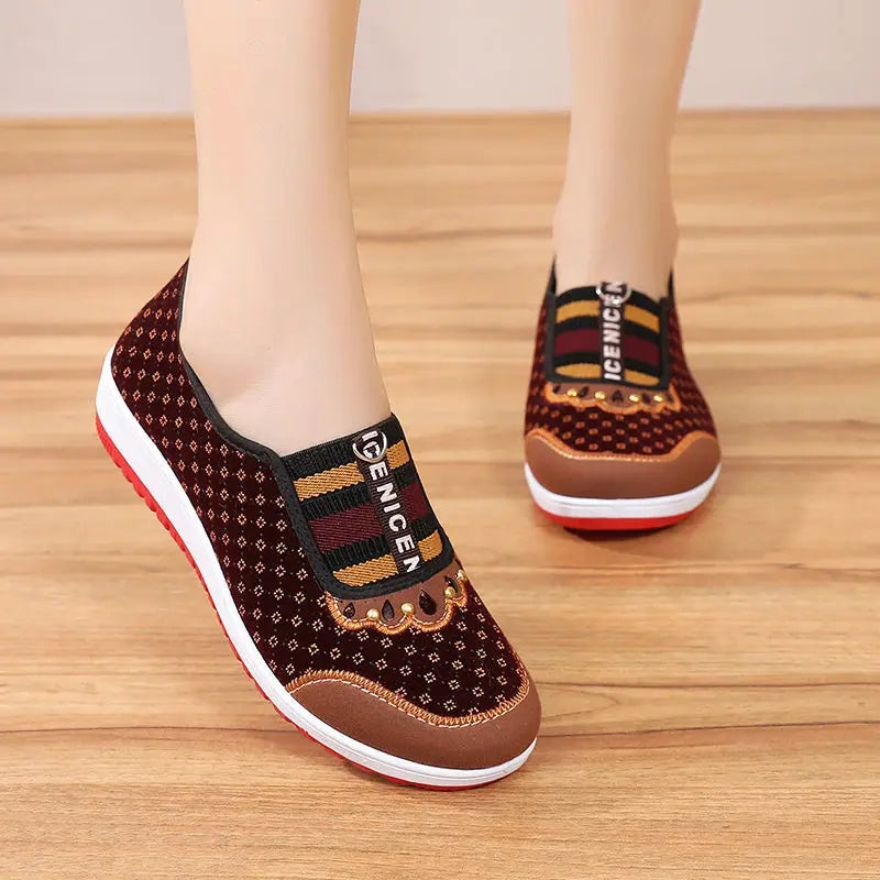 Non-slip walking shoes with soft soles for women.