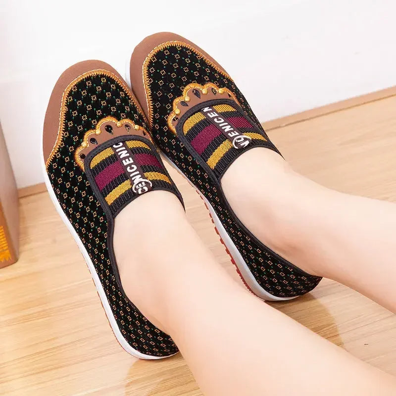 Non-slip walking shoes with soft soles for women.
